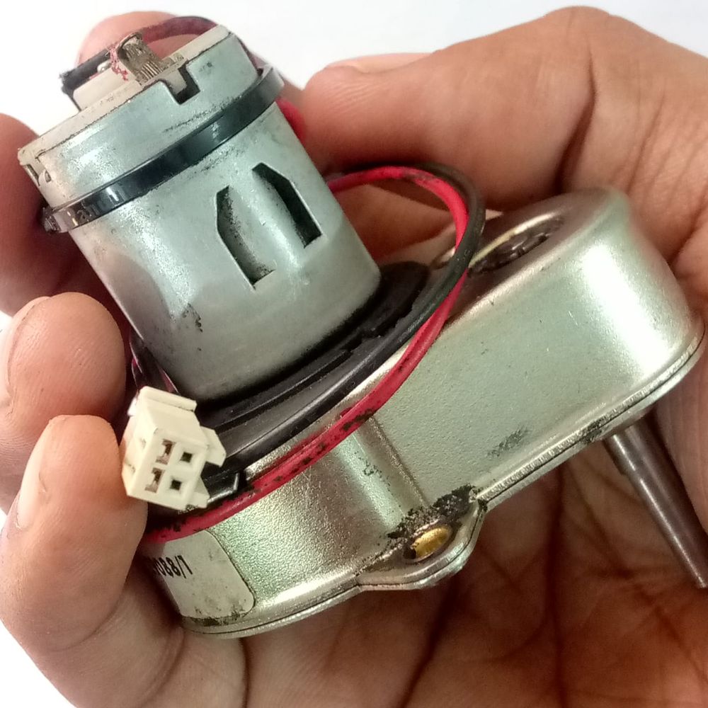 Used High Torque Gearbox Motor SP2688 Xerox 5855 Web Supply Motor - a silver cylindrical motor attached to a metal gearbox with a white connector.