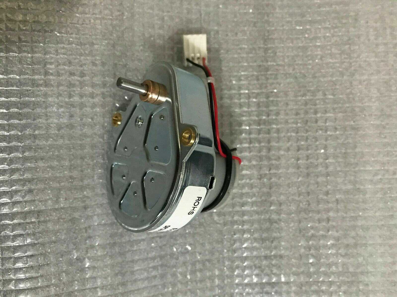 Used High Torque Gearbox Motor SP2688 Xerox 5855 Web Supply Motor - shown as a silver metal motor with a protruding shaft and a white connector cable.