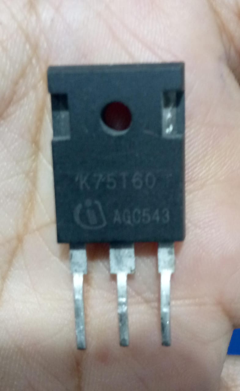 Used K75T60 IGBT - 600V 75A High-Power IGBT - a black three-pin electronic component held in a palm, featuring the K75T60 model number and Infineon logo printed on its front surface.
