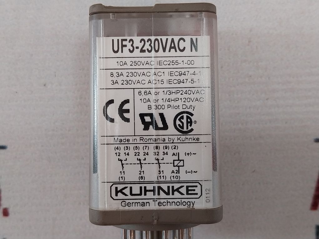 USED Kuhnke relays UF3B-24VDC N 24V - Kuhnke UF3-230VAC N relay, a rectangular grey electronic component with a clear plastic casing showing technical specifications and a wiring diagram.