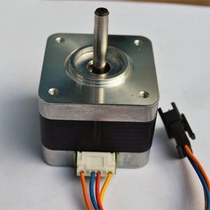 USED Minebea NEMA 17 Stepper Motor For 3d Printer & CNC - a square silver and black motor with a metal shaft, a white 4-pin connector, and an attached wiring harness.