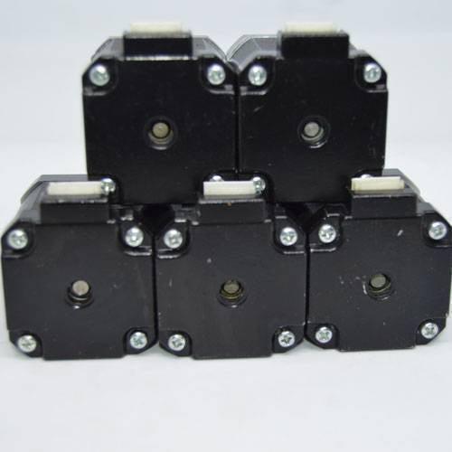 Used NEMA 17 4.2 Kg-cm Stepper Motor For CNC And 3d Printer - a stack of five black square stepper motors with white electrical connectors.