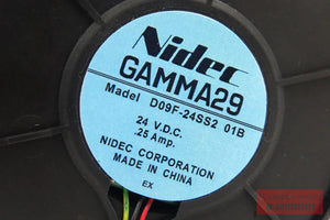 Used Nidec D09F-24SS2 01B 9cm 9733 24V 0.25A Turbo Blower Fan - a close-up of the blue circular label showing model details, 24 V.D.C., 0.25 Amp, and Nidec Corporation branding.