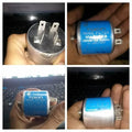 Used Noise Filter EMI Filter Anti-Interference Noise Signal Filtration Single Phase Mains Filter 125V 250V - a cylindrical blue EMI filter with four metal spade terminals, shown from multiple angles in a person's hand.