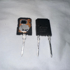 USED Onsemi 160A 650V FGY160T65SPD Onsemi IGBT-Digilog.pk - two black two-pin components, one intact and one with its internal copper and silicon structure exposed.