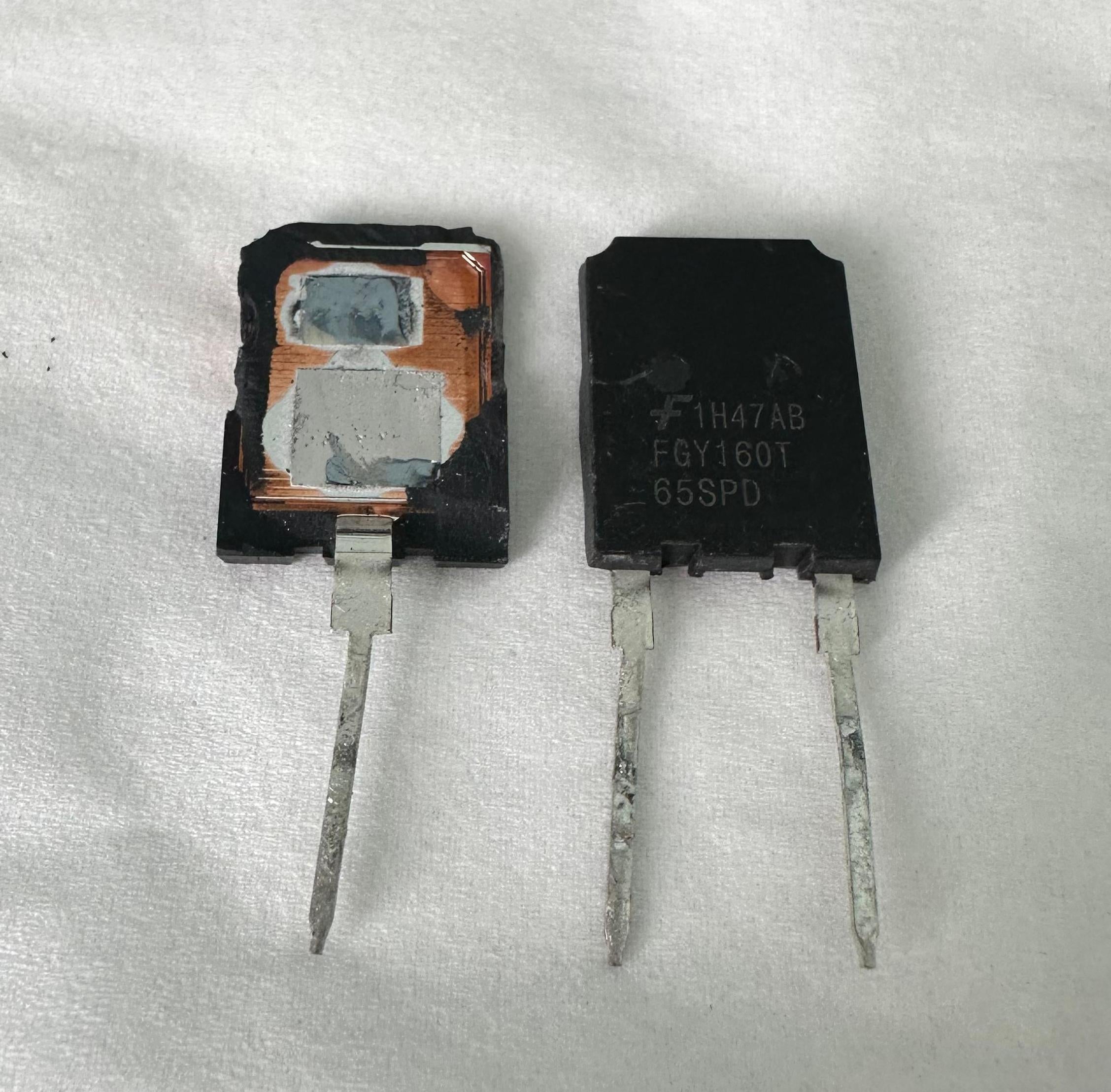 USED Onsemi 160A 650V FGY160T65SPD Onsemi IGBT-Digilog.pk - two black electronic components with two metal pins, one displaying the part number and specs.