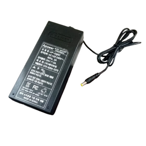 Used Power Supply Adapter 24V 5A 120W - a black rectangular AC/DC power brick with an attached output cable and a yellow-tipped barrel connector.
