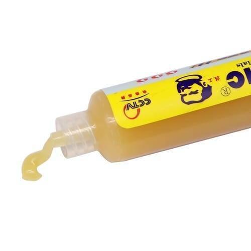 UV559 Mechanic Soldering Flux Paste UV559 No Clean BGA Solder Ball Repair Welding Paste For Phone PCB Pga SMD Rework - a close-up of a yellow squeeze tube with a small amount of translucent paste extruding from the nozzle.