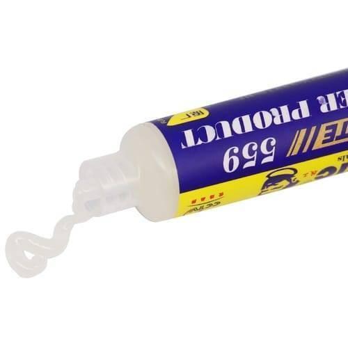 UV559 Mechanic Soldering Flux Paste UV559 No Clean BGA Solder Ball Repair Welding Paste For Phone PCB Pga SMD Rework - shown as a close-up of a blue and yellow tube with a clear nozzle dispensing a small amount of translucent gel.