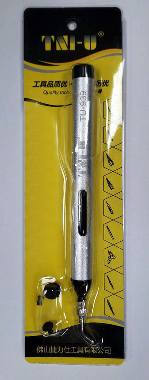 Vakum Pumpa Tu-939 SMD Tu-939 - a silver-coloured vacuum suction pen shown in its original yellow and black retail packaging with an extra suction tip.