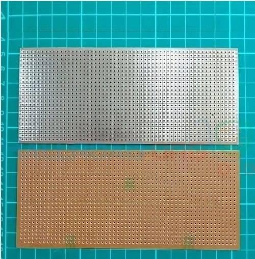 Veroboard Dotted Small Stripboard 6.5x14.5cm - shown as two rectangular circuit boards, one with a silver metallic side and one with a brown phenolic side.