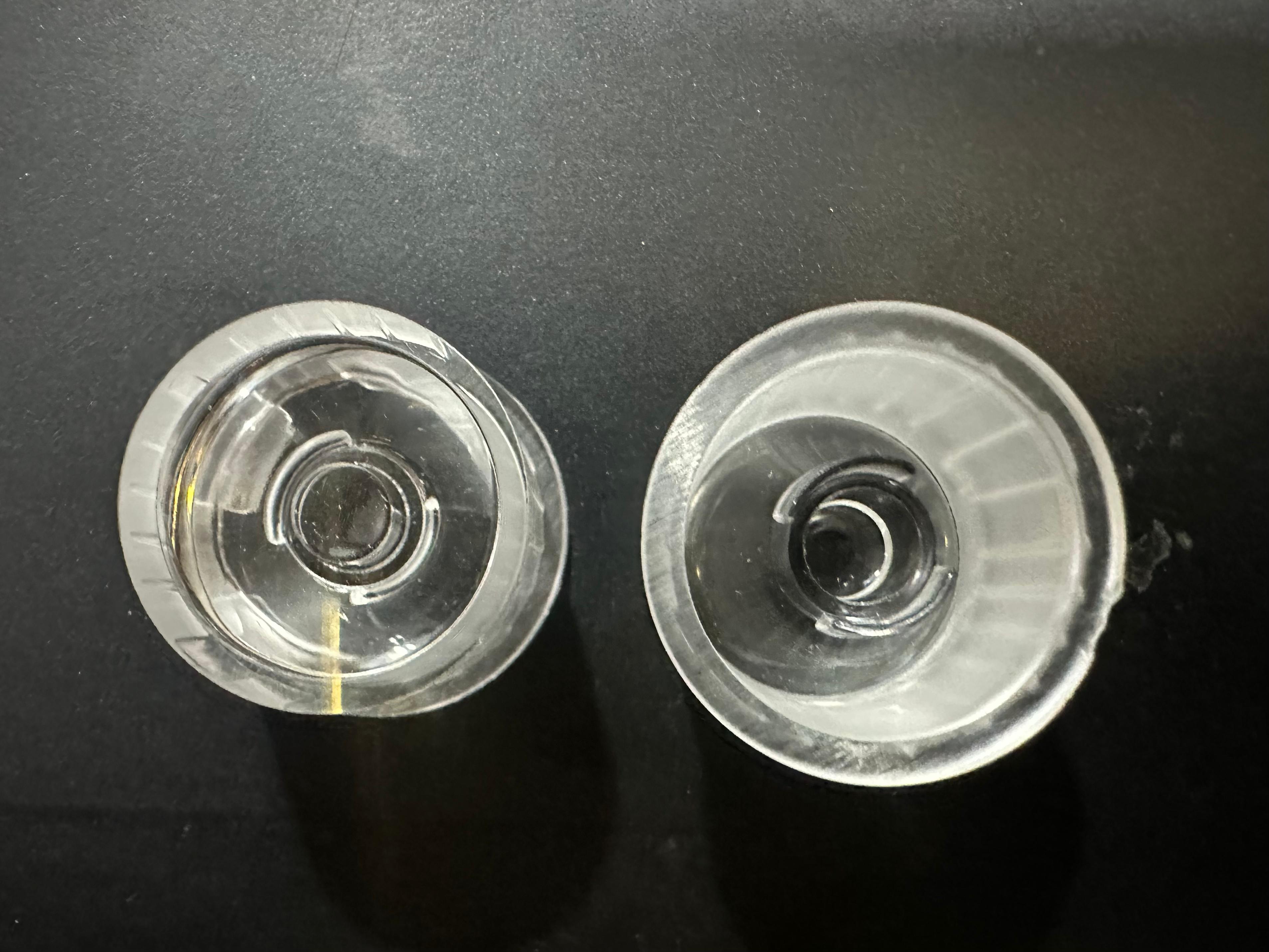Versatile Waterproof LED Lens 1W/3W 20mm Diameter Smooth surface 15°/30° Beam Options - a top-down view of two clear, circular optical lenses with internal light-focusing structures.