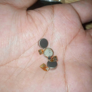 Vibrator Motor DC Mini Vibration Motor - shown as a close-up of three small, round, silver-colored motors with attached flexible ribbon cables.