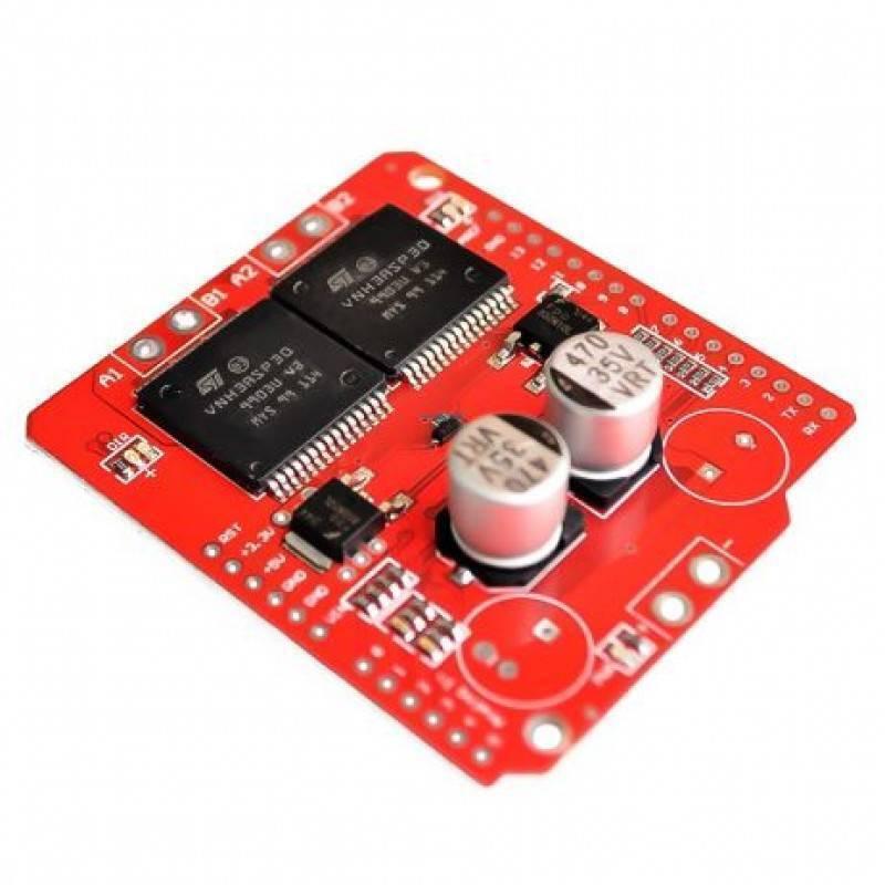 VNH3ASP30 Dual Monster DC Motor Driver Shield - a red circuit board featuring two large black ICs, two cylindrical capacitors, and various pin headers.