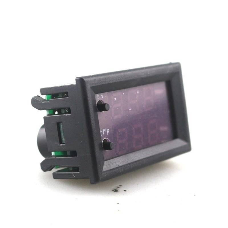 W1209WK W2809 Temperature Controller - a black rectangular digital display module with two small push buttons on the front panel.