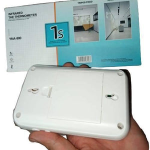 Wall Mounted Thermal Scanner ( Wall Mounted Temperature Scanner) Yna-800 - shown with its white rectangular back panel held in a hand in front of its blue and white product packaging box.
