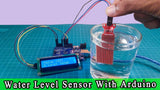 Water Level Sensor with Arduino UNO only products - a sensor in a glass of water connected to an LCD displaying "Value :533" and "W Level :HIGH".