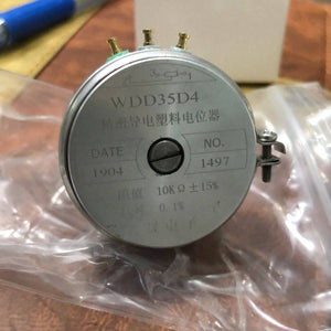 WDD35D4 10k Ohm 2W Continues Potentiometer Angle Sensor Displacement Sensor Variable Resistor - a round silver metal sensor with three top terminals and a black center dial, shown in a clear plastic bag.