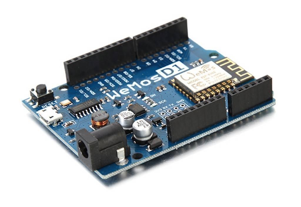 Wemos D1 R1 WiFi ESP8266 Development Board - a blue rectangular circuit board featuring a power jack, micro USB port, reset button, and pin headers.