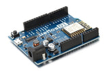 Wemos D1 R1 WiFi ESP8266 Development Board - a blue rectangular circuit board featuring a power jack, micro USB port, reset button, and pin headers.