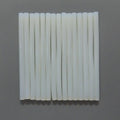 White Hot Glue Gun Sticks 7mm Length 8 to 10 Inch Approx - shown as a collection of twelve white, cylindrical glue sticks arranged side-by-side.