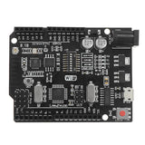 WiFi R3 ATMEGA328P + ESP8266 Development Board | Arduino UNO WiFi CH340G - a black rectangular circuit board featuring a DC power jack, USB port, reset button, and DIP switches.