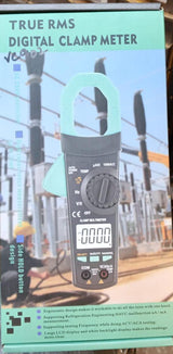 Winrpex VC902 AC 1000V Digital Clamp Meter pricein pakistan - its retail packaging box, showing the grey and teal device with a rotary dial, display, and input ports.