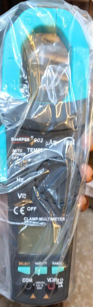 Winrpex VC902 AC 1000V Digital Clamp Meter pricein pakistan - multimeter in clear plastic packaging, showing a black body, teal clamp, rotary dial, three buttons, and input ports.