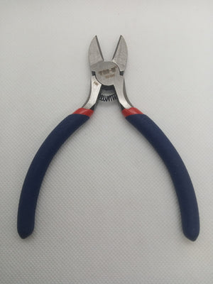 Wire Cutter Cable Cutter With Coil Spring - a pair of metal wire cutters with blue and red rubberized handles and a small visible coil spring.