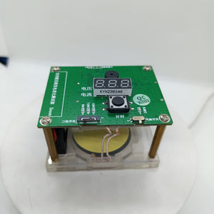 Wireless Charger Tester Smart Watches QI Wireless Charger Tester Voltage Current Load PCB Detector for Apple iWatch Galaxy Watch Wireless Chargers - a green PCB with a three-digit display, a central push button, a sliding switch, and a visible circular charging coil.