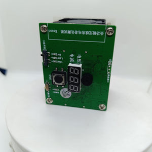 Wireless Charger Tester Smart Watches QI Wireless Charger Tester Voltage Current Load PCB Detector for Apple iWatch Galaxy Watch Wireless Chargers - a green PCB with a three-digit LED display, a push button, a cooling fan, and power selection switches.