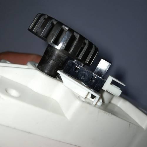 Worm Gear High Torque 12V 5RPM DC Gear Motor - a close-up showing the black plastic gear and the attached black switch component on the white motor body.