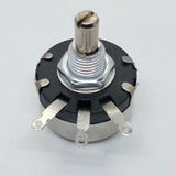 WX110(010) 5k 2W Potentiometer - shown from a high angle, featuring a silver metal shaft, a threaded mounting nut, and three metal connection terminals.