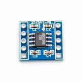 X9C104 100k Digital Potentiometer Module Controllable Resistor For Arduino - a square blue circuit board with an eight-pin integrated circuit labeled X9C104S 729 and four capacitors.