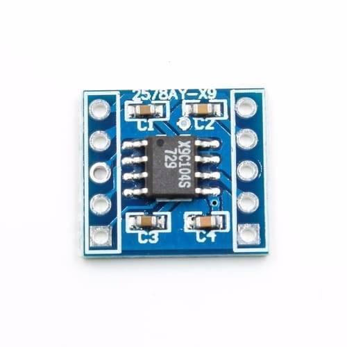 X9C104 100k Digital Potentiometer Module Controllable Resistor For Arduino - a square blue circuit board with an eight-pin integrated circuit labeled X9C104S 729 and four capacitors.