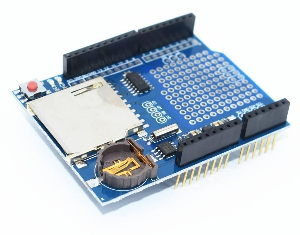 Xd-204 Adafruit Data Logger Shield - a blue circuit board featuring a silver SD card slot, a coin cell battery holder, a red button, and black headers.
