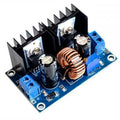 XH-M407 XL4016E1 DC To DC Buck Voltage Regulator 8A Module - XH-M407 DC-DC buck converter on a blue PCB with twin heatsinks, a toroidal inductor, blue input and output screw terminals and an adjustment trimmer.