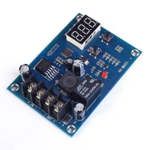 XH-M603-M632 Battery Charging Control Module DC 12V-24V Voltage Charging Discharge Monitor Relay Switch Battery Protection Board - a blue rectangular circuit board featuring a three-digit LED display, two push buttons, and a relay.