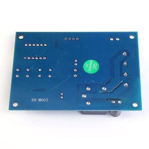 XH-M603-M632 Battery Charging Control Module DC 12V-24V Voltage Charging Discharge Monitor Relay Switch Battery Protection Board - the blue rectangular printed circuit board from the bottom side with visible solder points and text.