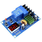XH-M604 Battery Charger Control Module DC 6-60V Storage Lithium Battery Charging Control Switch Protection Board - a blue circuit board featuring a digital display showing 12.0, a large relay, two buttons, and a heatsink.