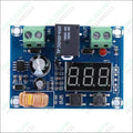 XH-M609 Low Voltage Disconnect Module 12-36V for Arduino in Pakistan - a blue circuit board featuring a digital display, a black relay, two screw terminals, two buttons, and a coil.