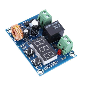 XH-M609 Low Voltage Disconnect Module 12-36V for Arduino in Pakistan - a blue circuit board featuring a three-digit LED display, two push buttons, a black relay, and green terminals.