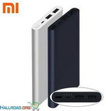 Xiaomi 10000mAh Mi Power Bank - shown in silver and dark blue, with a close-up of the top ports, including an input, output, and LED indicator lights.