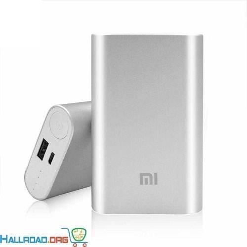 Xiaomi 10000mAh Mi Power Bank - shown in silver with one USB port, one micro-USB port, a circular power button, and four LED indicator lights.