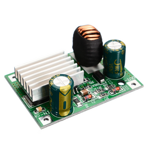 XK-539 5V 3A Buck Converter DC 9V 12V 24V 36V 48V 72V 84V 90V TO 5V 3A Step Down Module Power Supply DC DC Converter Buck Converter Step Up Converte - a green circuit board featuring a silver heatsink, two cylindrical capacitors, and a copper coil inductor on a white background.