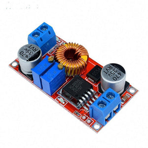 XL4015 Step-down Buck Charging Board DC 0.8-30V To 5-32V - a red circuit board featuring two blue screw terminals, a copper inductor, two blue potentiometers, and capacitors.