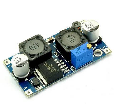 XL6009 Buck Boost Convertor Module - a blue circuit board with two black inductors, two silver capacitors, a blue potentiometer, and a black chip.