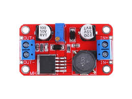 XL6019 5A DC-DC Step Up Boost Converter Price - a red rectangular circuit board featuring a blue potentiometer, two screw terminals, and a black inductor.