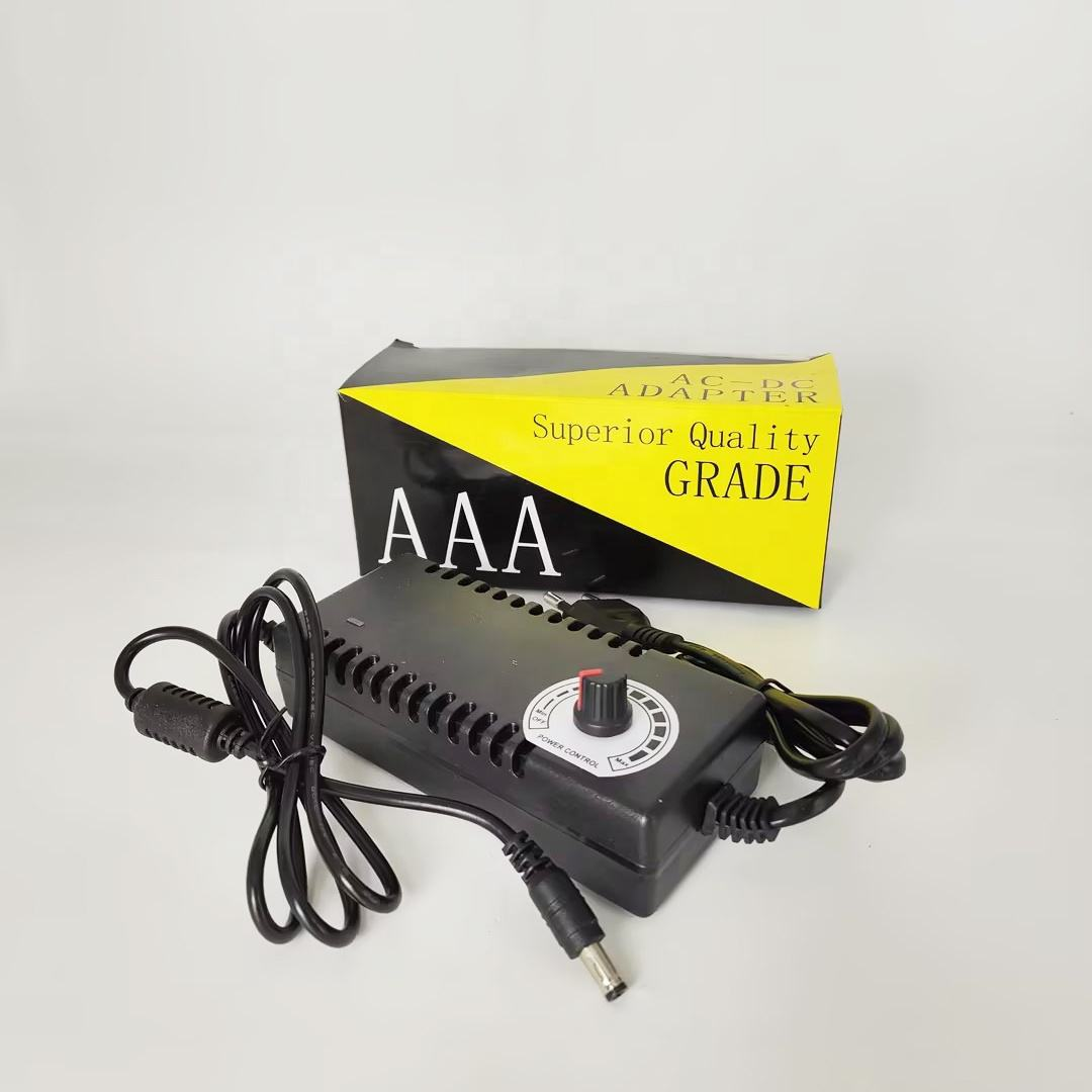 XR-F315 AC DC Power Adapter AC100-240V 3-15V 10A with Potentiometer Adjustable for Motor - black rectangular body, a rotary power control knob, attached power cables, and its yellow and black branded box.