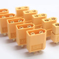 XT60 XT-60 Male Female Bullet Connectors Plugs - a collection of yellow plastic male and female bullet plugs arranged on a white surface.